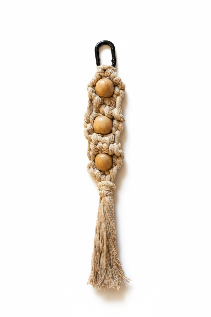 Beige bag charm with beads