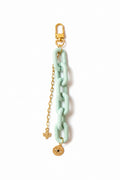 Mint green resin and gold bag charm